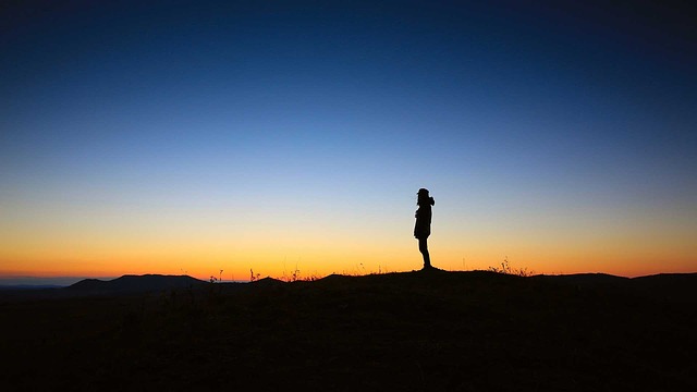 silhouette of a woman standing