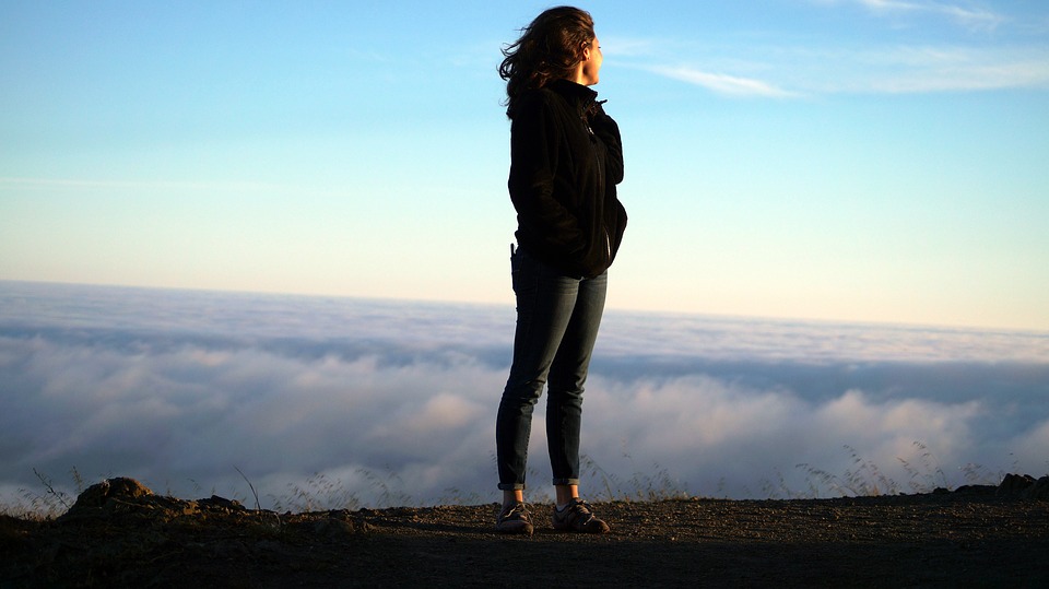 woman standing high